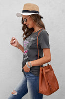 
              With The Band Tee
            