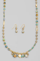 
              Glass Bead and Charms Necklace Set
            