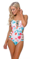 
              One Piece Bathing Suit with Strapping Details
            