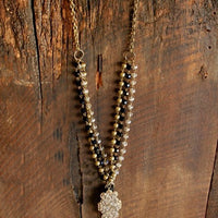 Black and Gold Beaded Chain with Leather Tassel