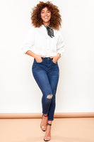 
              Petite High Rise Rips + Whiskers Skinny Jean
            