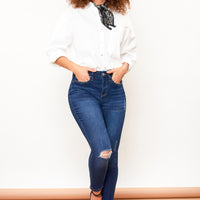 Petite High Rise Rips + Whiskers Skinny Jean