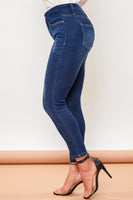 
              Petite High Rise Rips + Whiskers Skinny Jean
            