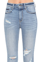 
              High Rise Distressed Ankle Jeans
            