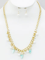 
              Antler Tusk Horn Pearl Clustered Necklace Set
            